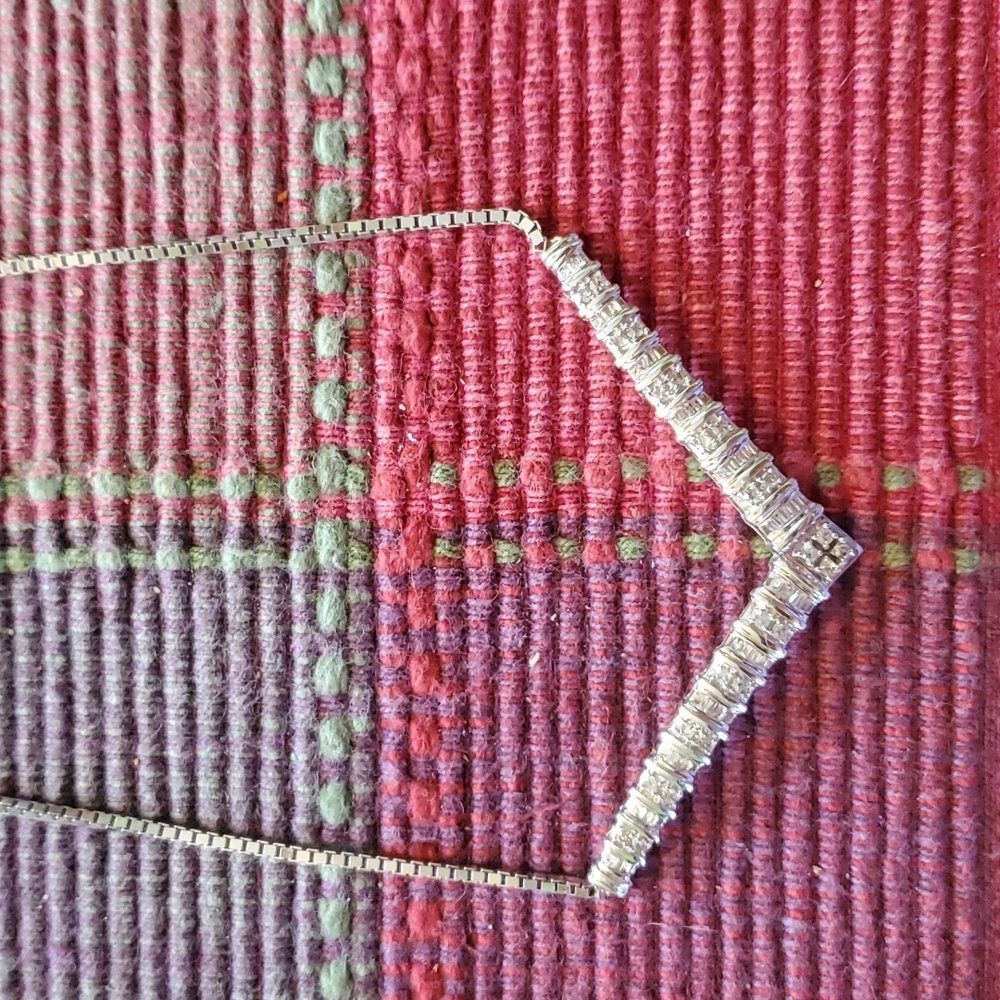 Silver and diamond necklace purchased from jewelry store in Hot Springs,Arkansas